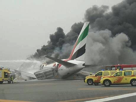 Firefighter dies as Emirates plane with 300 passengers crash-land at Dubai airport